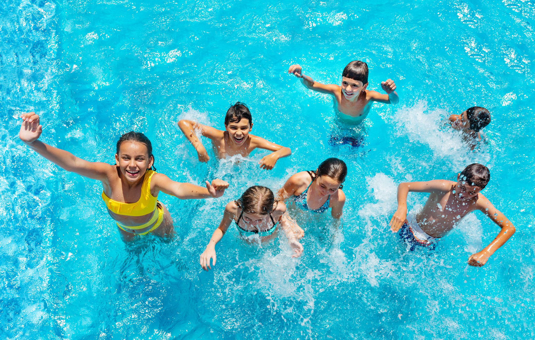 Children Having Fun in the Pool  